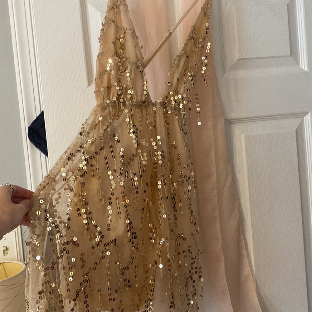 Women’s sparkly dress with sheer shorts under (romper style)